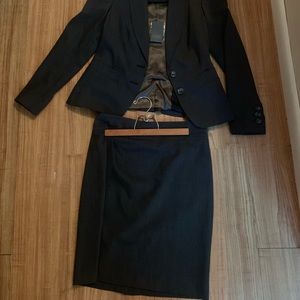 Skirt suit, tags still on